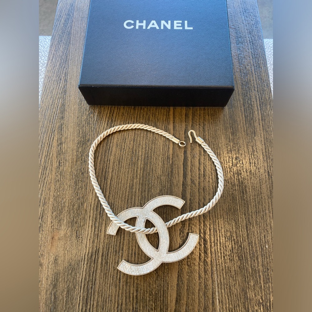 CHANEL Necklace. Spring 2008. Oversized CC logo in python skin and gold hardware